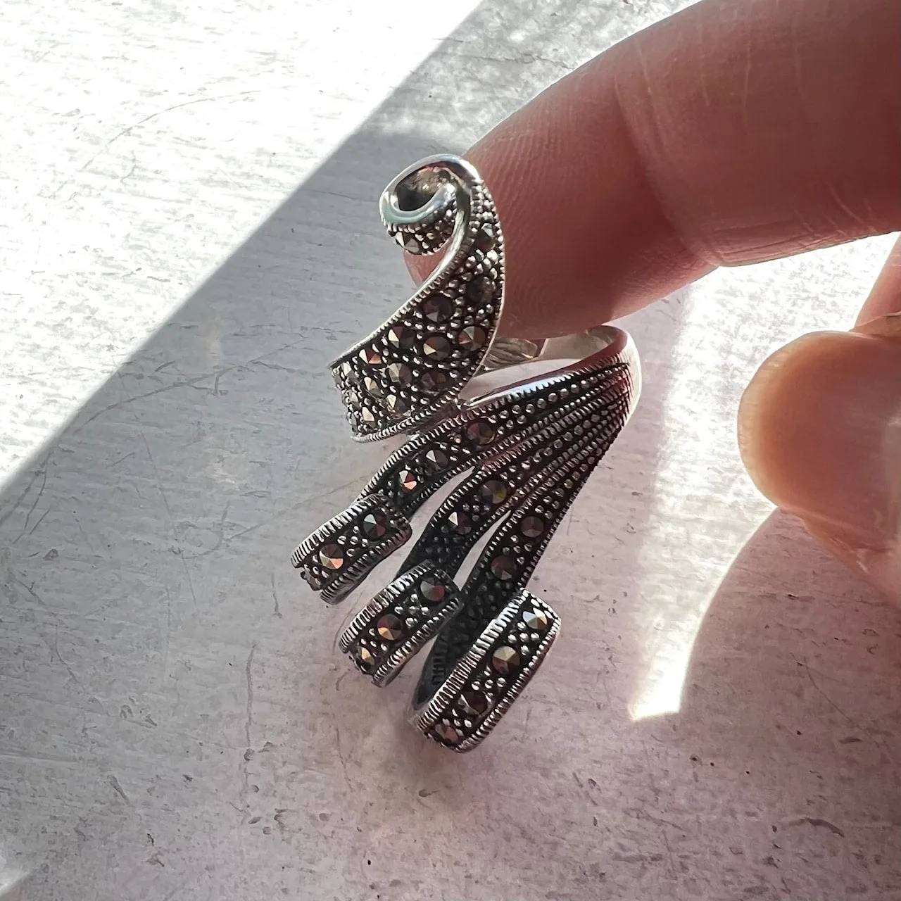 Marcasite and Sterling Silver 4 Lines Curving Up Dimension Ring sold by Zulily