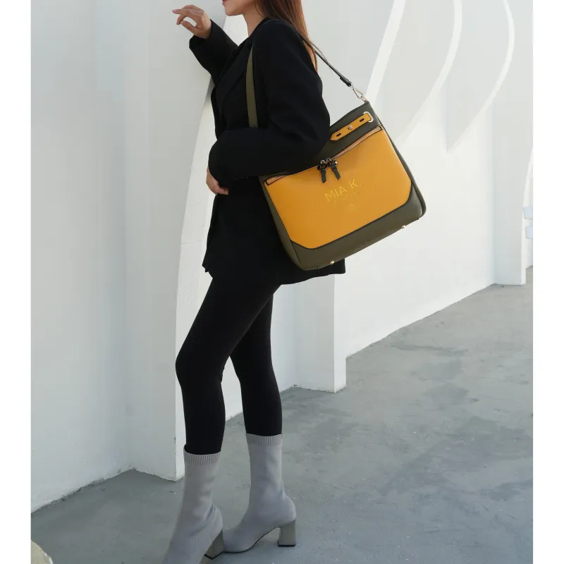 Evie two-tone Vegan Leather Women's Shoulder bag  sold by Zulily