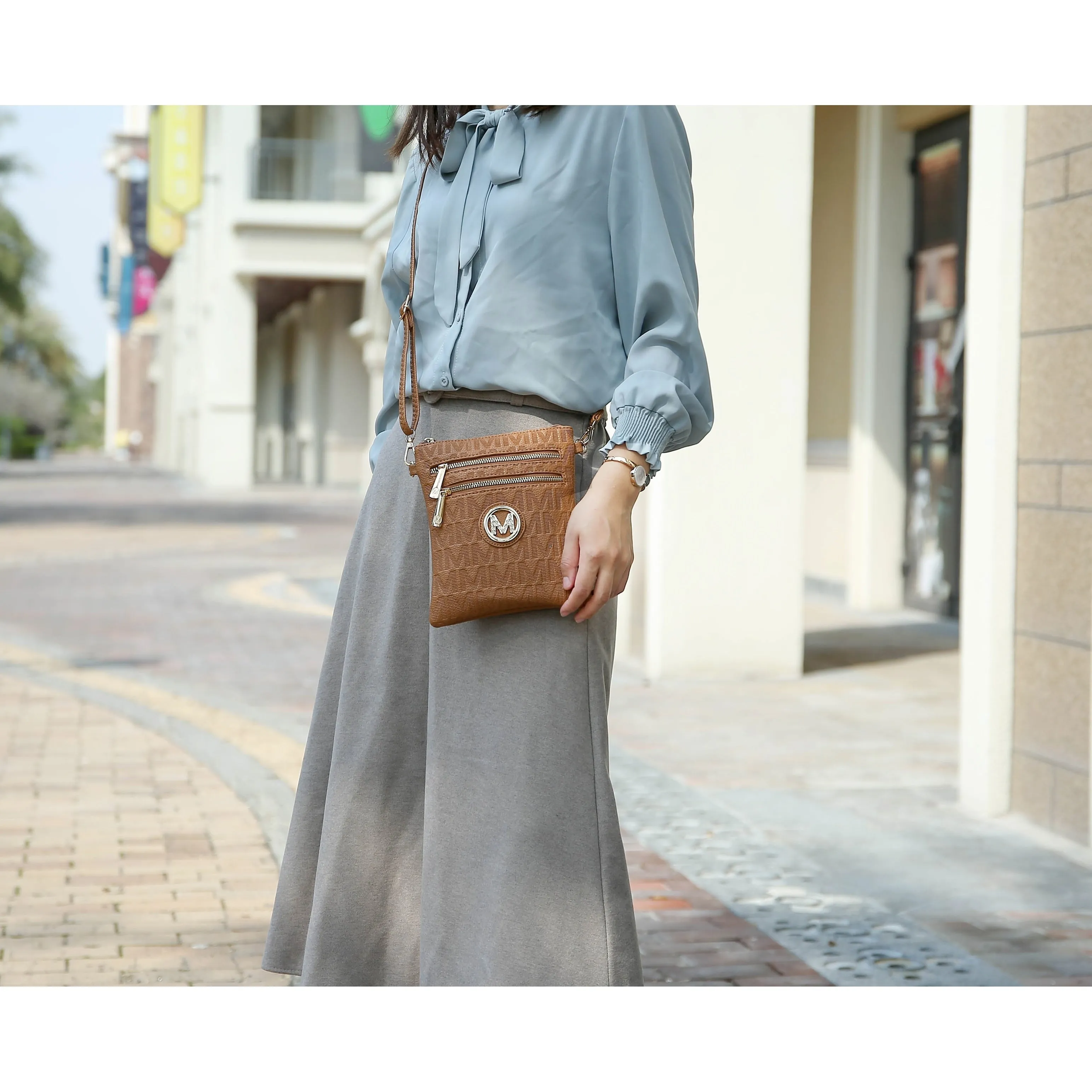 Andrea Milan M Signature Crossbody Bag sold by Zulily