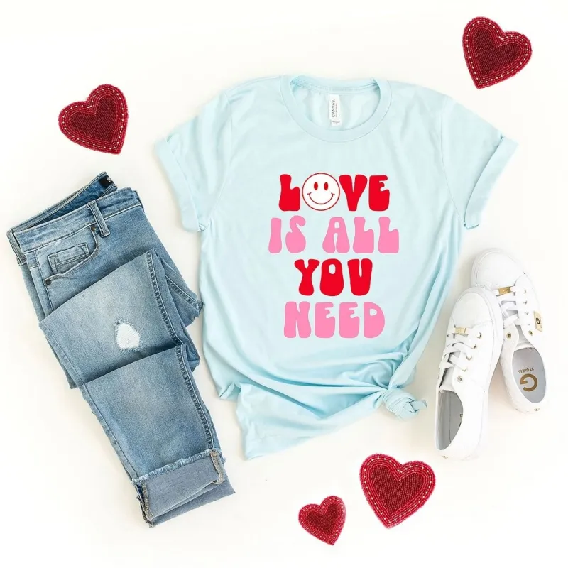 Love Is All You Need Smiley Short Sleeve Crewnneck Tee sold by Zulily