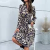 Navy Abstract Tie Waist Long Sleeve Dress sold by Zulily