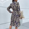 Navy Abstract Tie Waist Long Sleeve Dress sold by Zulily