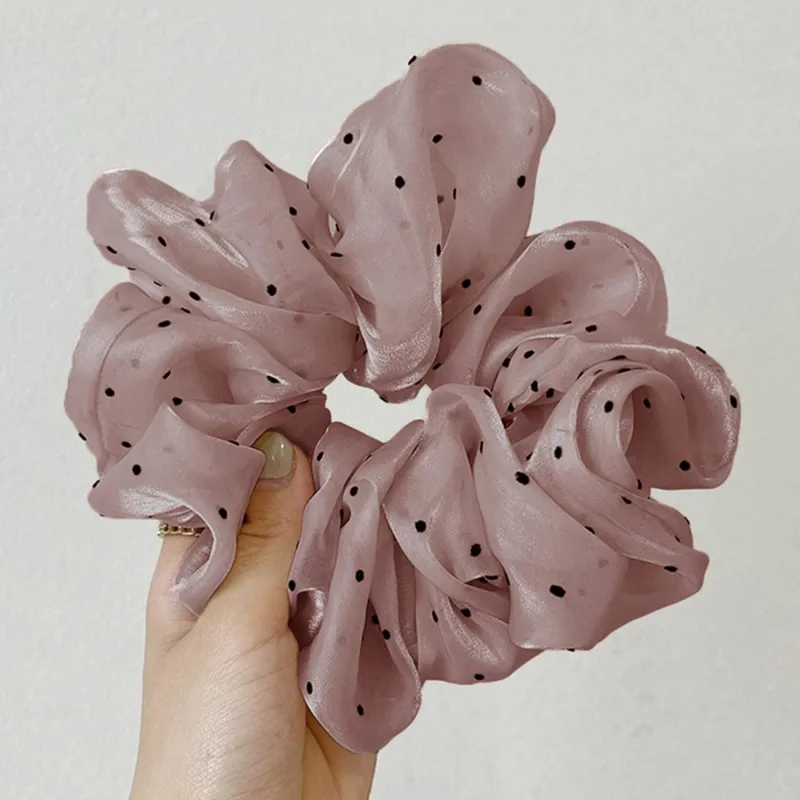 Purple Polka Dot Hair Tie sold by Zulily