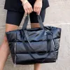 Metallic Puffer Tote sold by Zulily