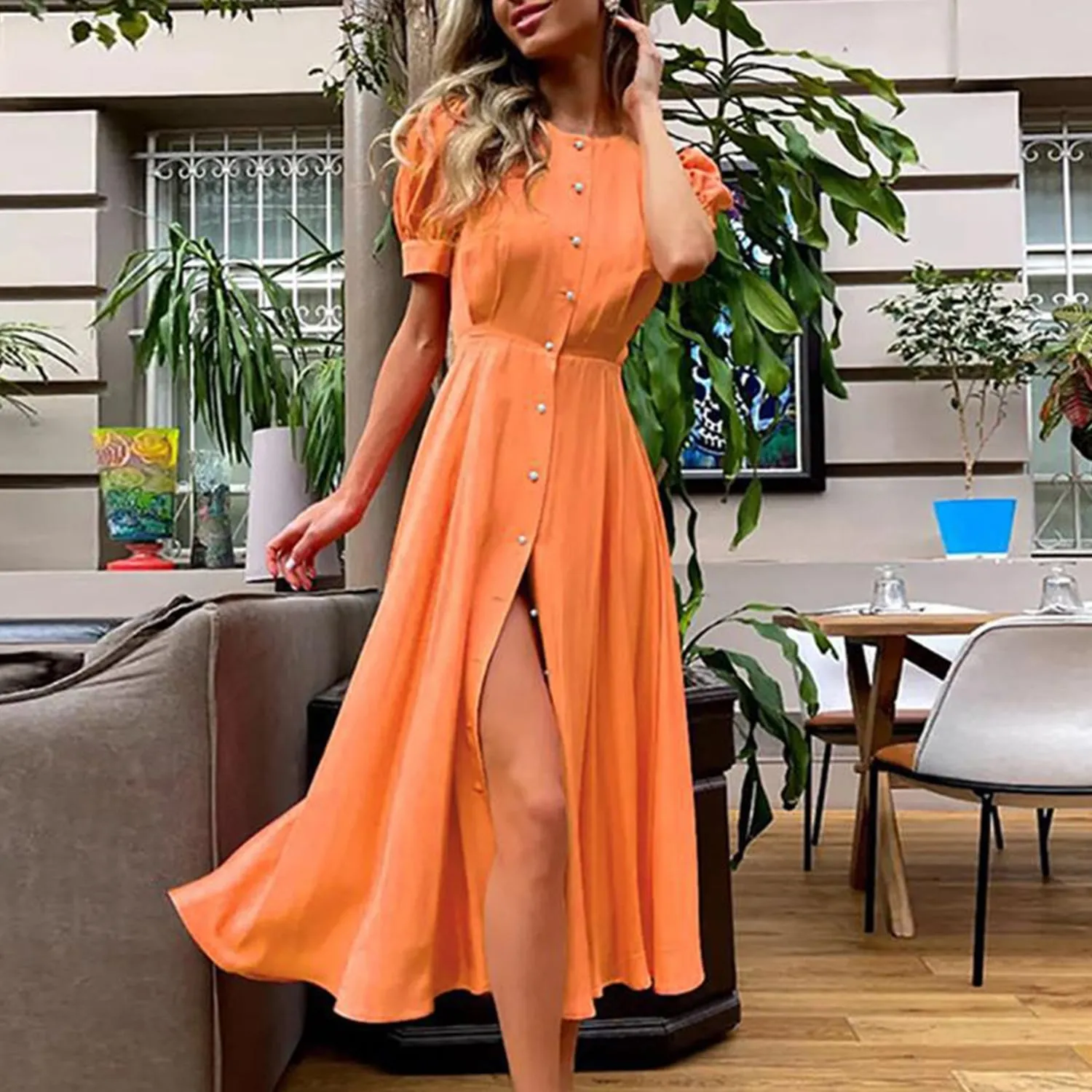 Orange Button Up Puff-Sleeve Dress sold by Zulily