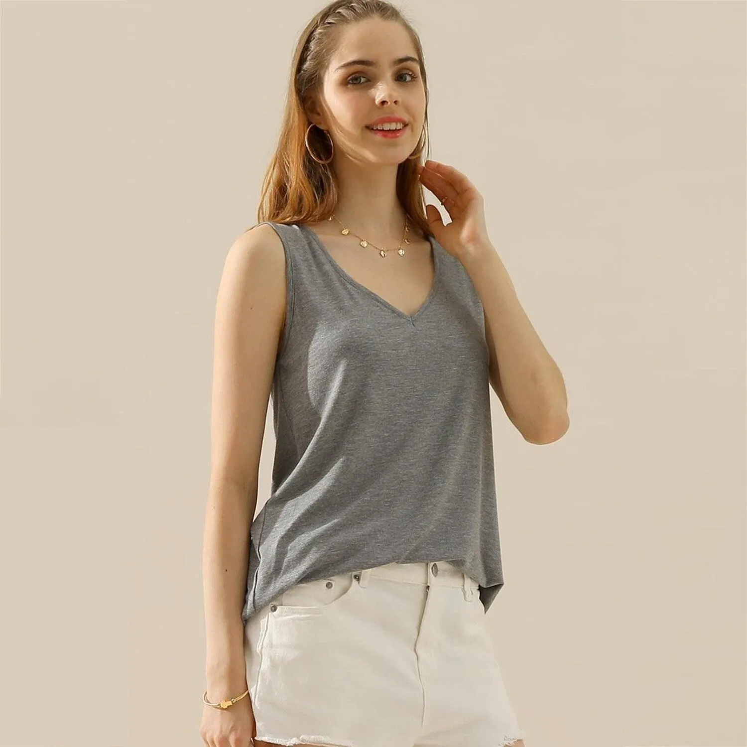 GREY V-Neck Curved Hem Tank sold by Zulily