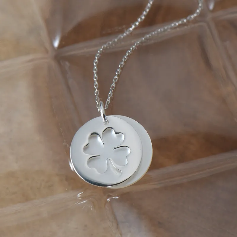 Sterling Silver Two Layers of Mother of Pearl and Round Clover Cutout Charm Necklace sold by Zulily