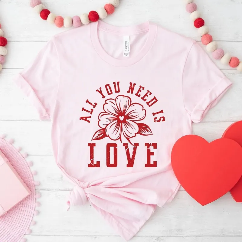 All You Need Is Love Flower Short Sleeve Crewnneck Tee sold by Zulily