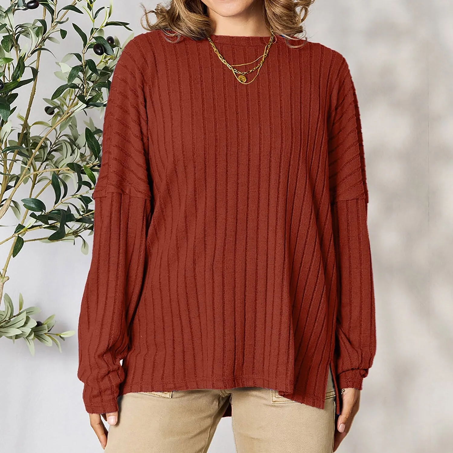 Rust Ribbed Round Neck Slit Knit Top sold by Zulily