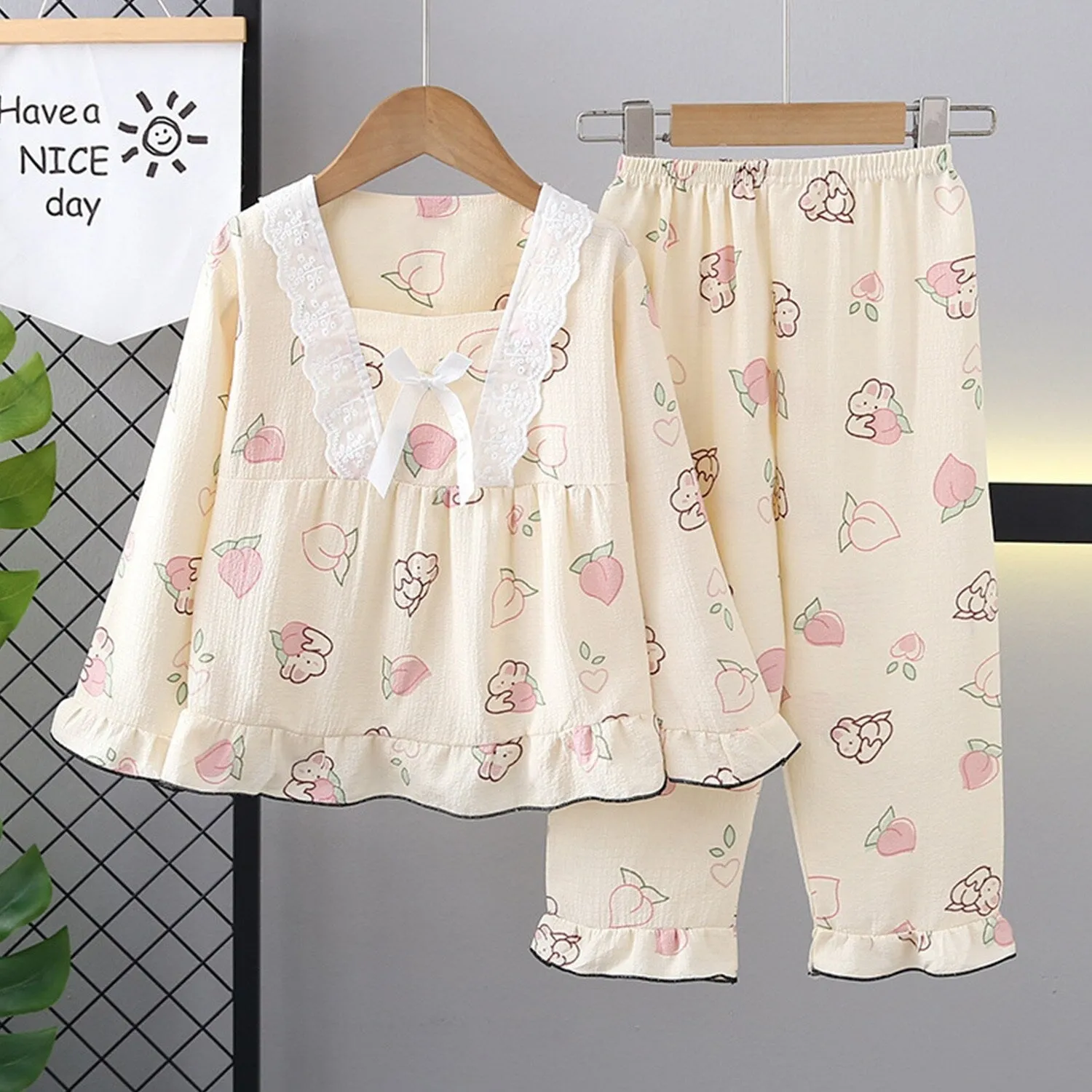 Pink Peach Bunny Ruffle-Accent Loungewear Set sold by Zulily