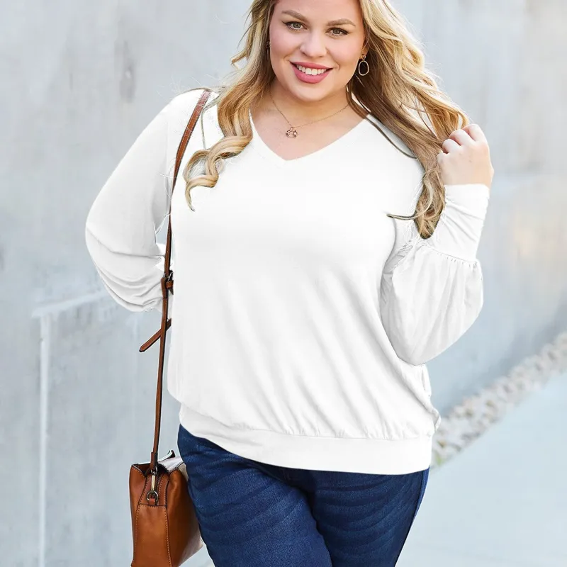 White V-Neck Lantern Sleeve Top sold by Zulily