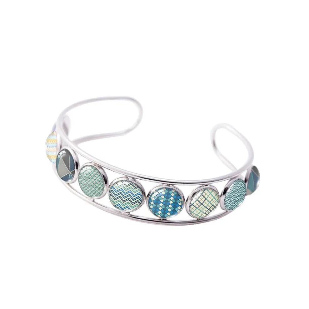 Blue Silvertone Floral Button Cuff sold by Zulily