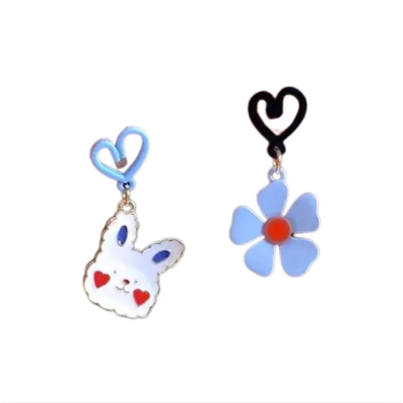 Asymmetrical White Bunny Blue Flower Earrings - Multi sold by Zulily