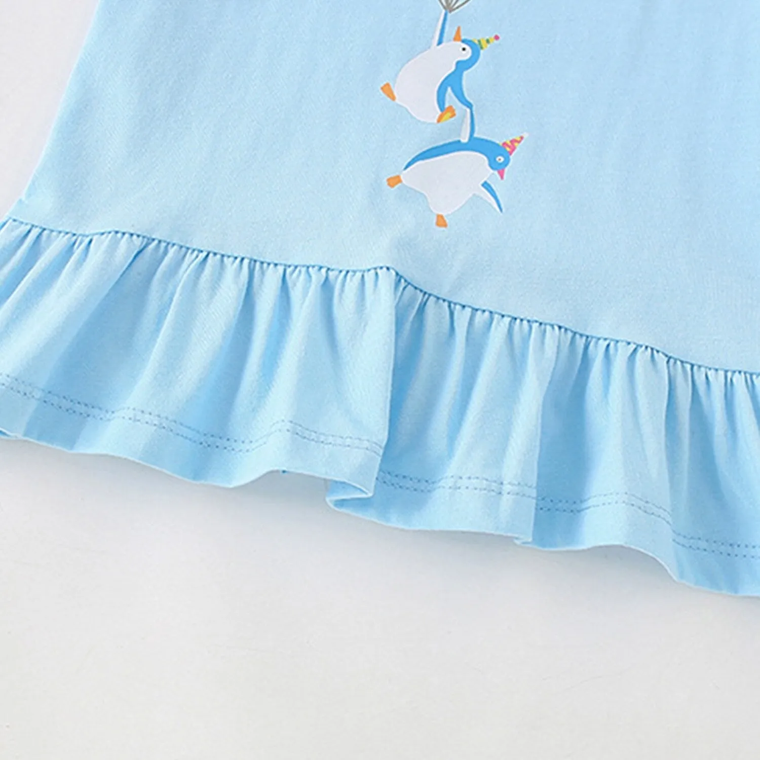 Light Blue Penguin Ruffle-Hem Top sold by Zulily product image thumbnail 4