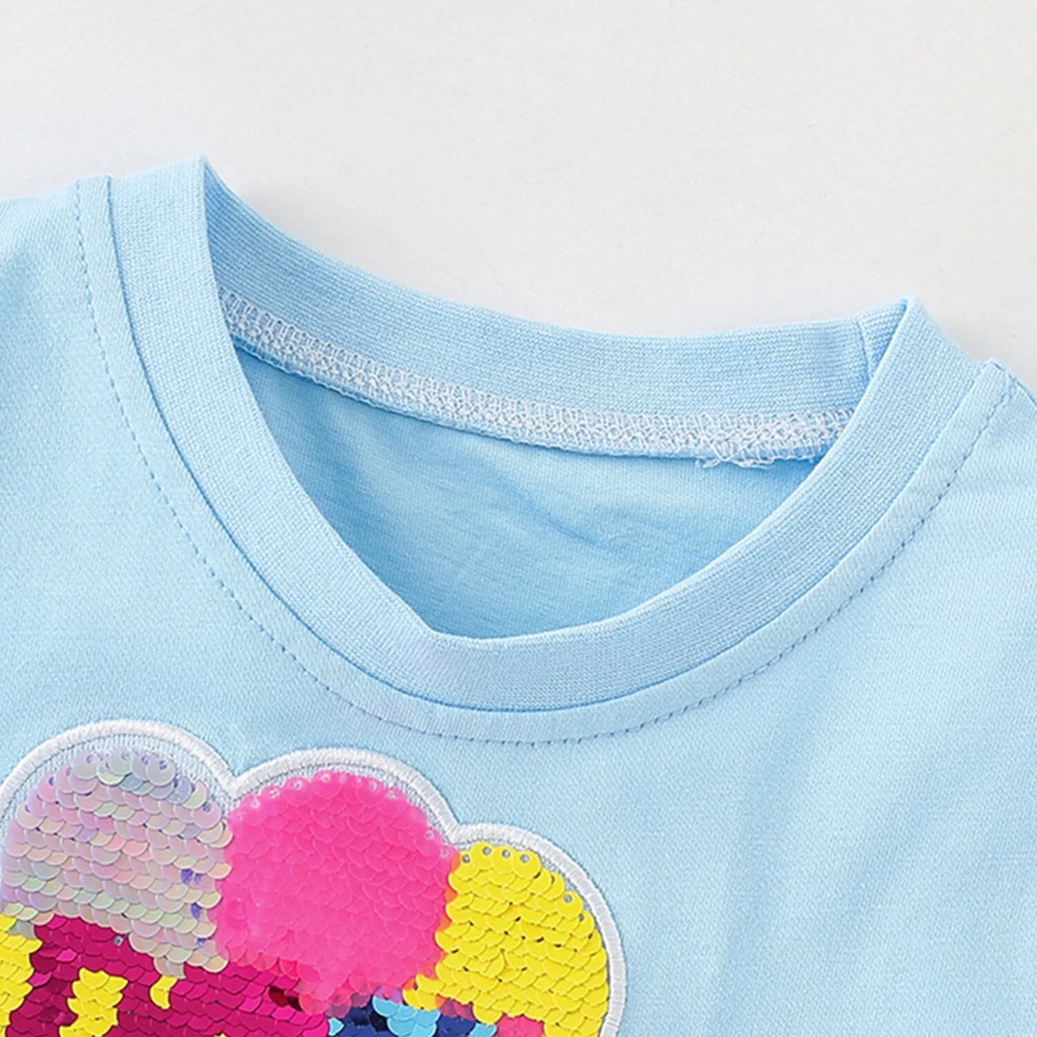 Light Blue Penguin Ruffle-Hem Top sold by Zulily product image thumbnail 2