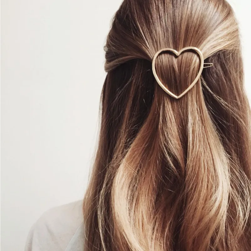 Goldtone Open Heart Hair Clip sold by Zulily
