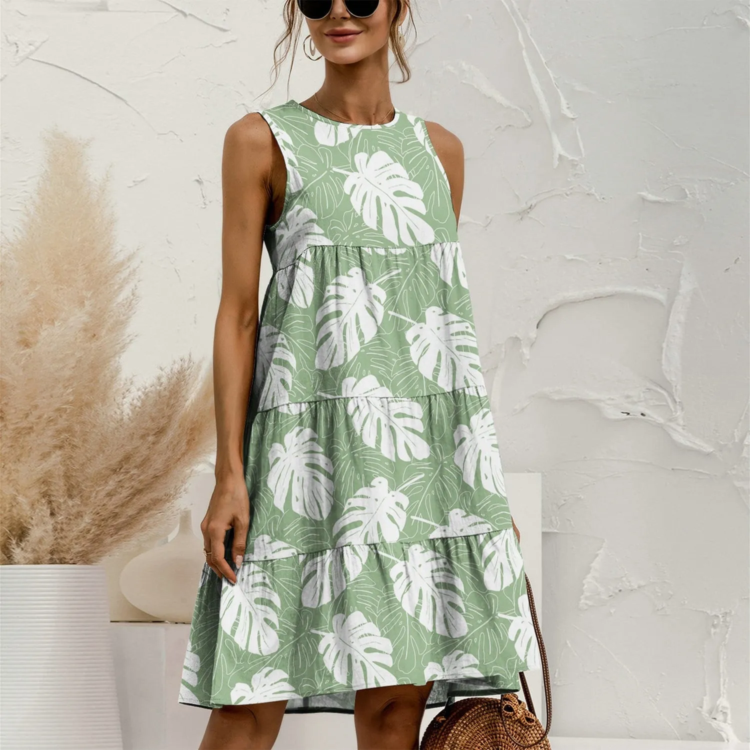 Green & White Leaf Tiered Round Neck Sleeveless Dress sold by Zulily