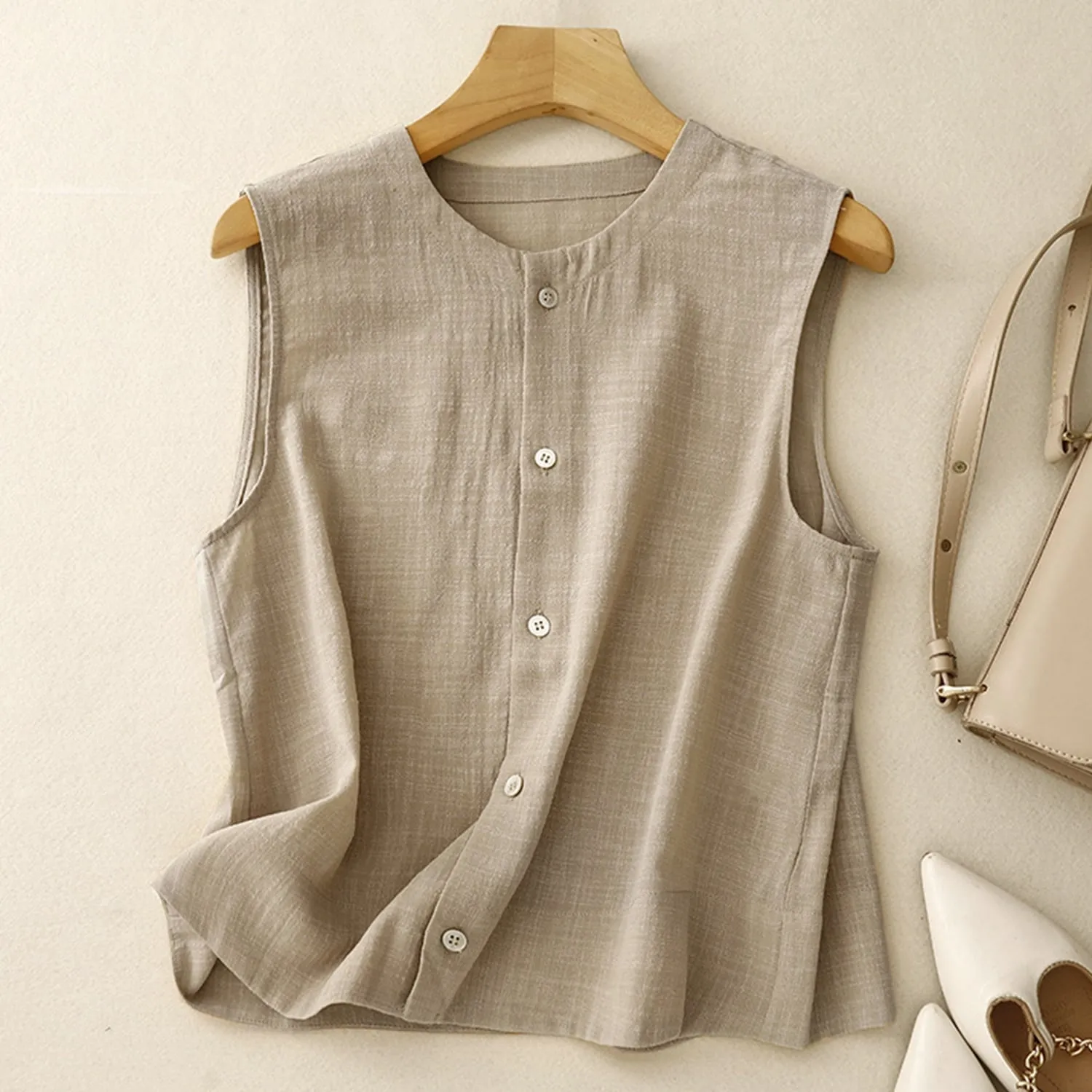 Khaki Button-Up Sleeveless Top sold by Zulily