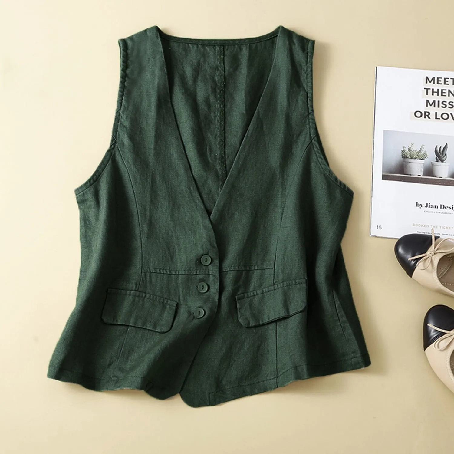 Dark Green Button Vest sold by Zulily