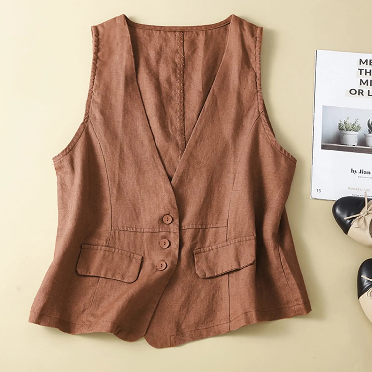 Burnt Orange Button Vest sold by Zulily