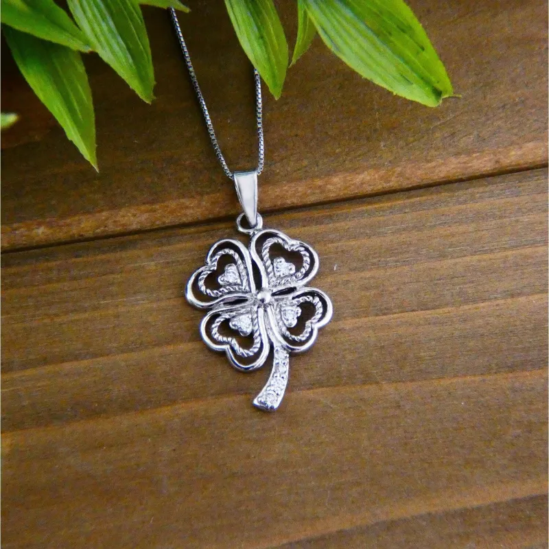 Sterling Silver Clover Layer line with tiny hearts Charm Necklace sold by Zulily