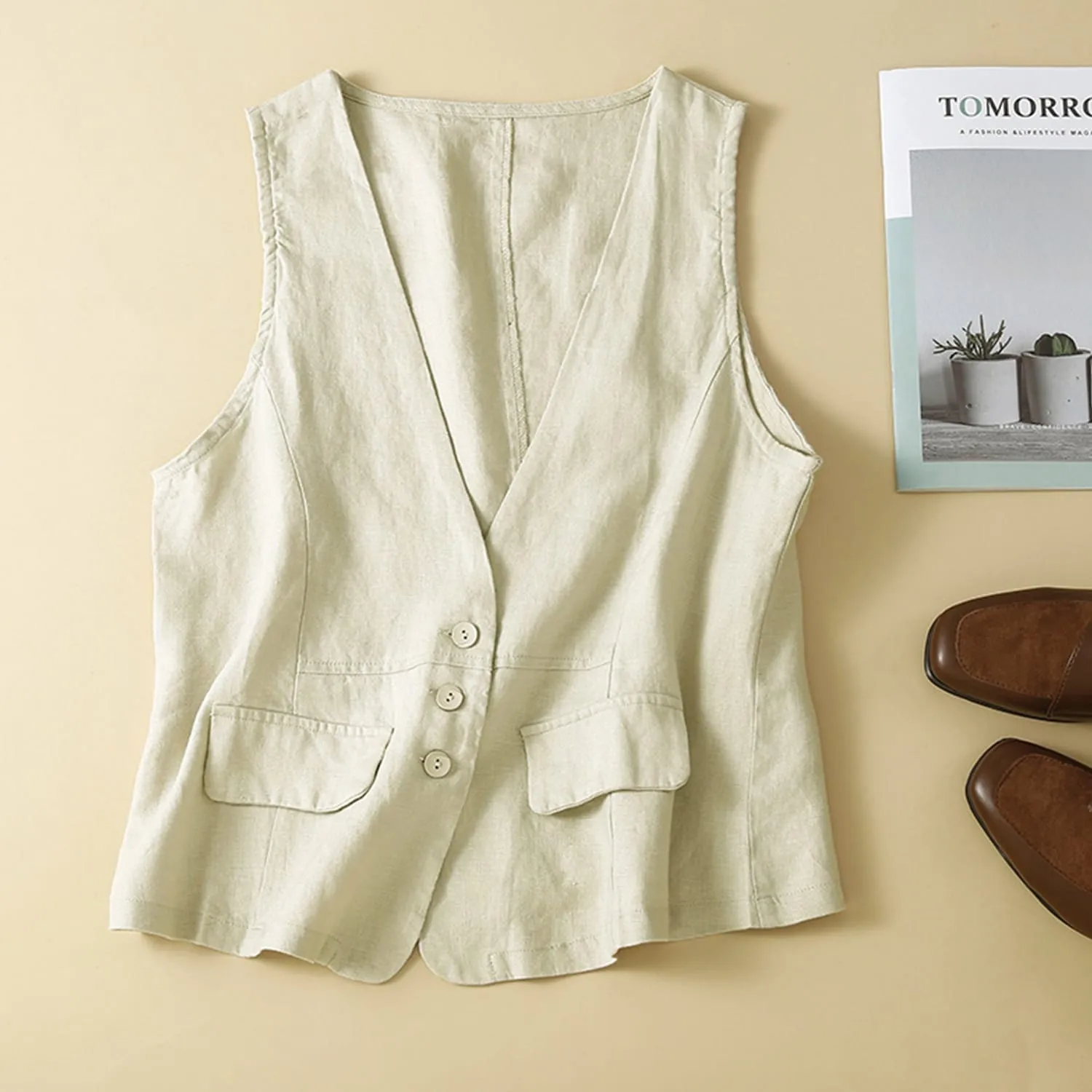 Beige Button Vest sold by Zulily