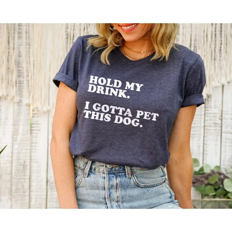 hold my drink, I gotta pet this dog women's oversized tee sold by Zulily