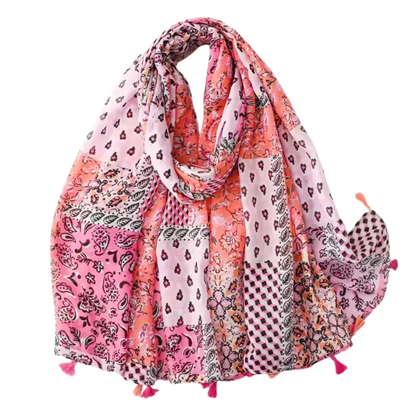 Vibrant Patchwork Boho Scarf with Tassel Accents sold by Zulily
