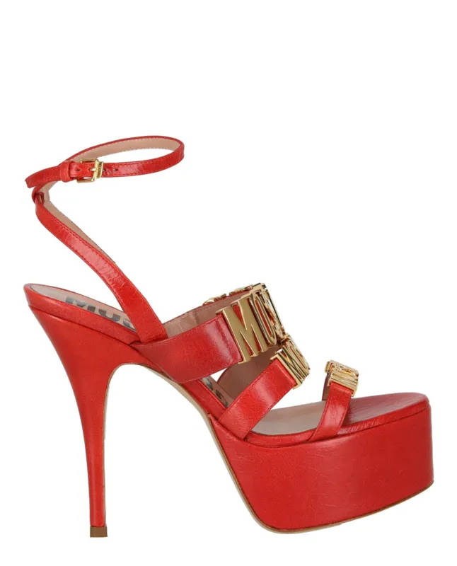 Moschino Degrade Metal Logo Heeled Sandals sold by Zulily
