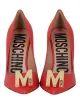 Moschino Gold-Tone Logo Pump sold by Zulily