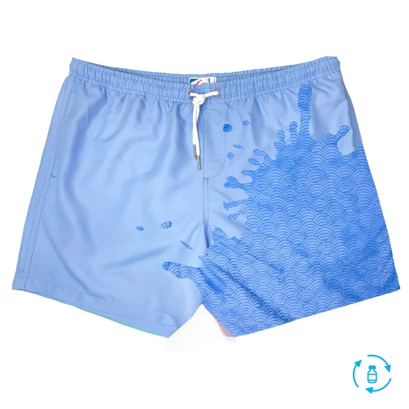 Bermies Blue to Waves Swim Trunks sold by Zulily
