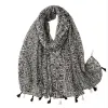 Black Multi Pattern Scarf sold by Zulily