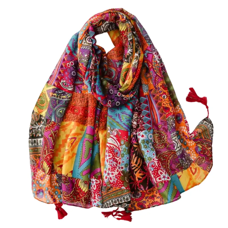 Boho Patchwork Print Scarf with Tassel Accents sold by Zulily