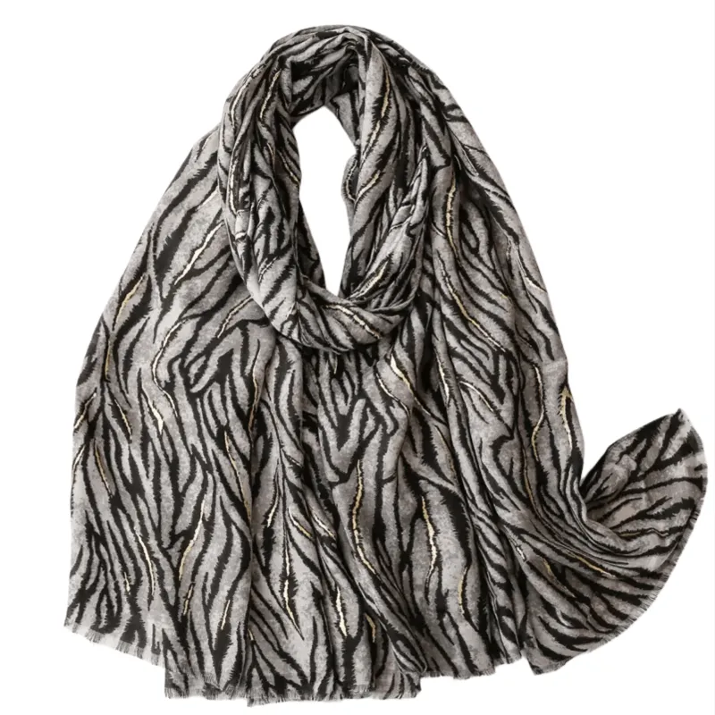 Bold Zebra Inspired Scarf with Gold Highlights sold by Zulily