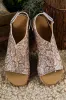Vintage Floral Hollowed Platform Sandals by Threaded Pear sold by Zulily