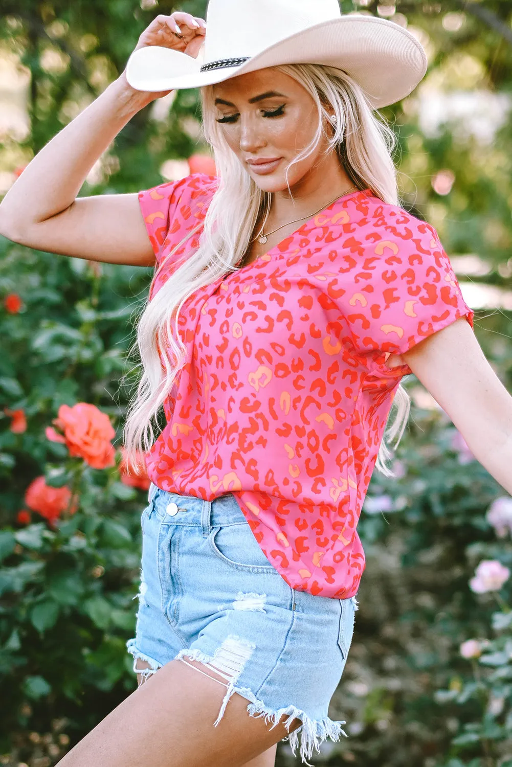 Charley Leopard V Neck Short Sleeve Blouse by Threaded Pear sold by Zulily product image thumbnail 3