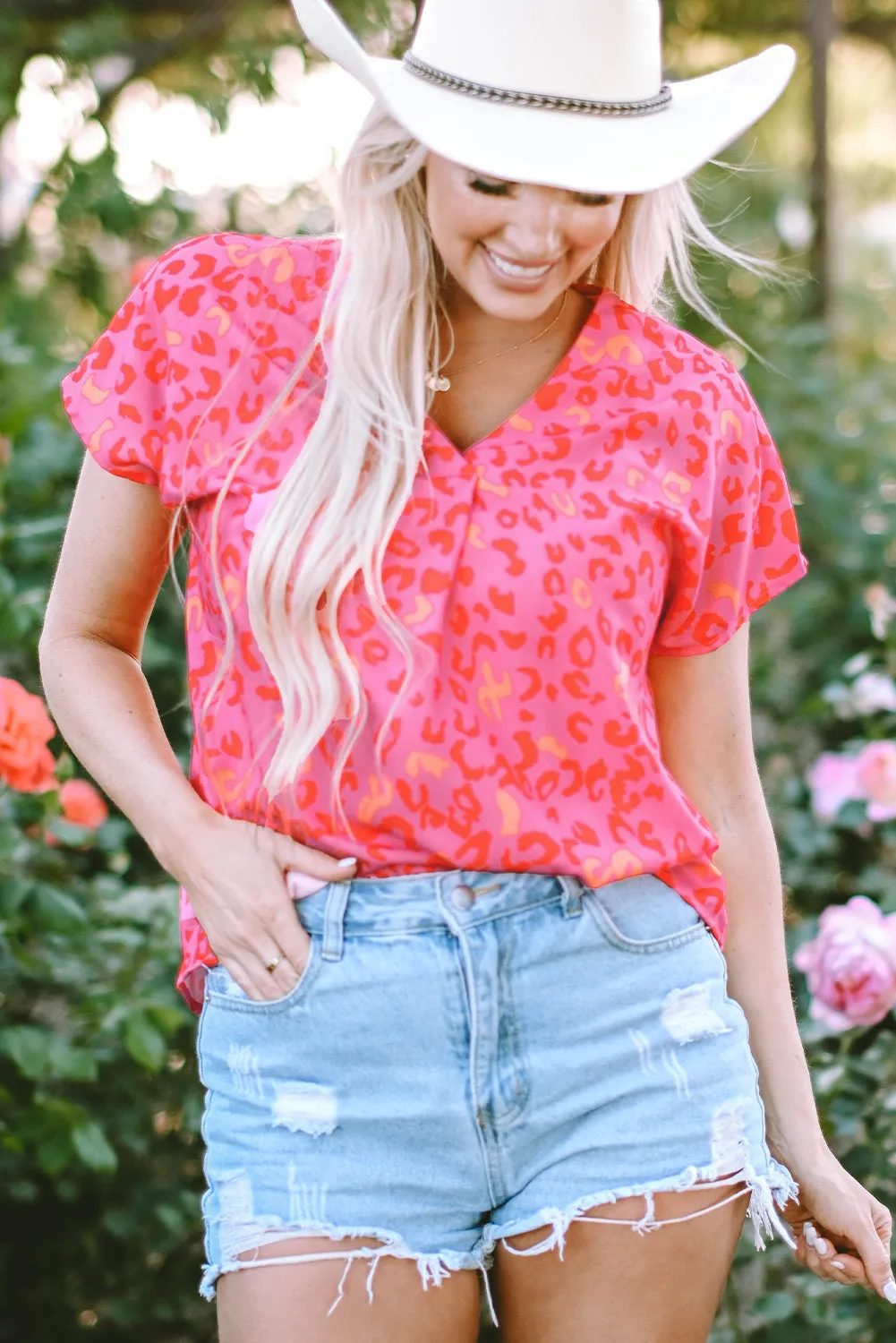 Charley Leopard V Neck Short Sleeve Blouse by Threaded Pear sold by Zulily product image thumbnail 4