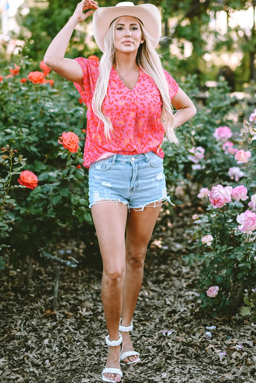 Charley Leopard V Neck Short Sleeve Blouse by Threaded Pear sold by Zulily product image thumbnail 5