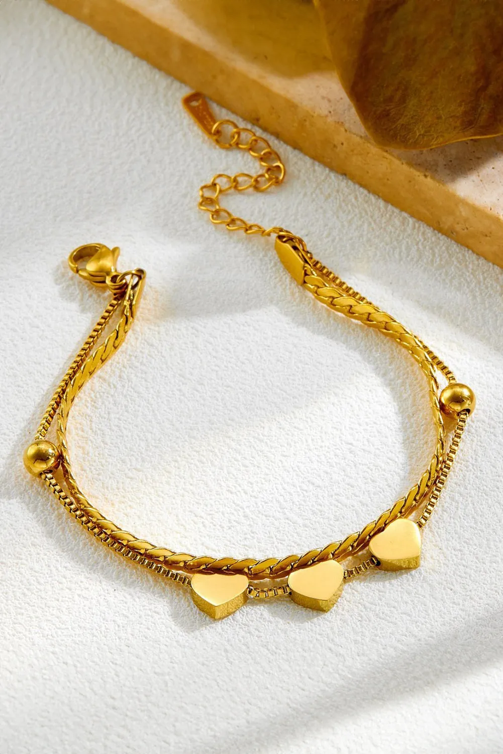 Gold Triple Heart Double Layer Adjustable Chain Bracelet by Threaded Pear sold by Zulily product image thumbnail 2