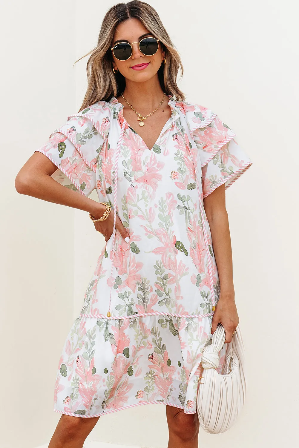 Madalyn Floral Contrast Edge Layered Short Sleeve Mini Dress by Threaded Pear sold by Zulily