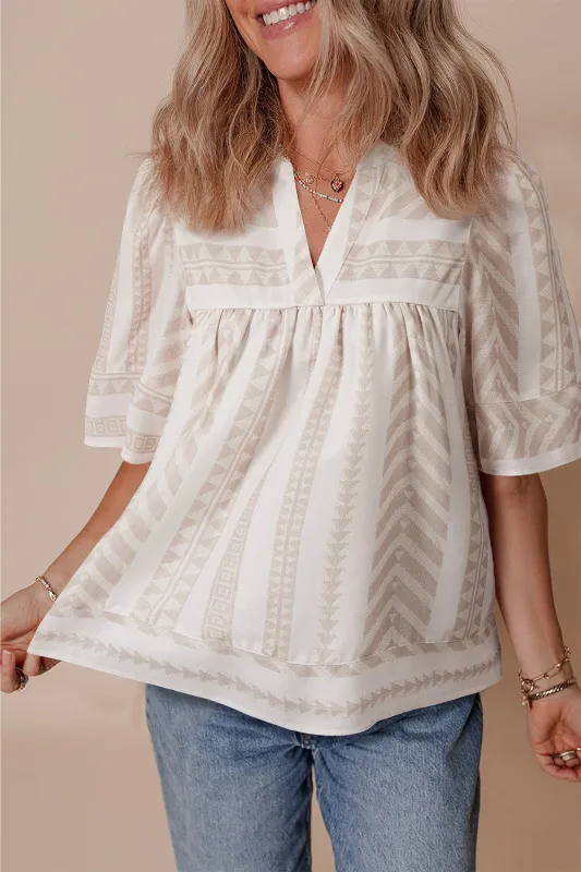 Analia Jacquard Split V Neck Short Sleeve Blouse by Threaded Pear sold by Zulily