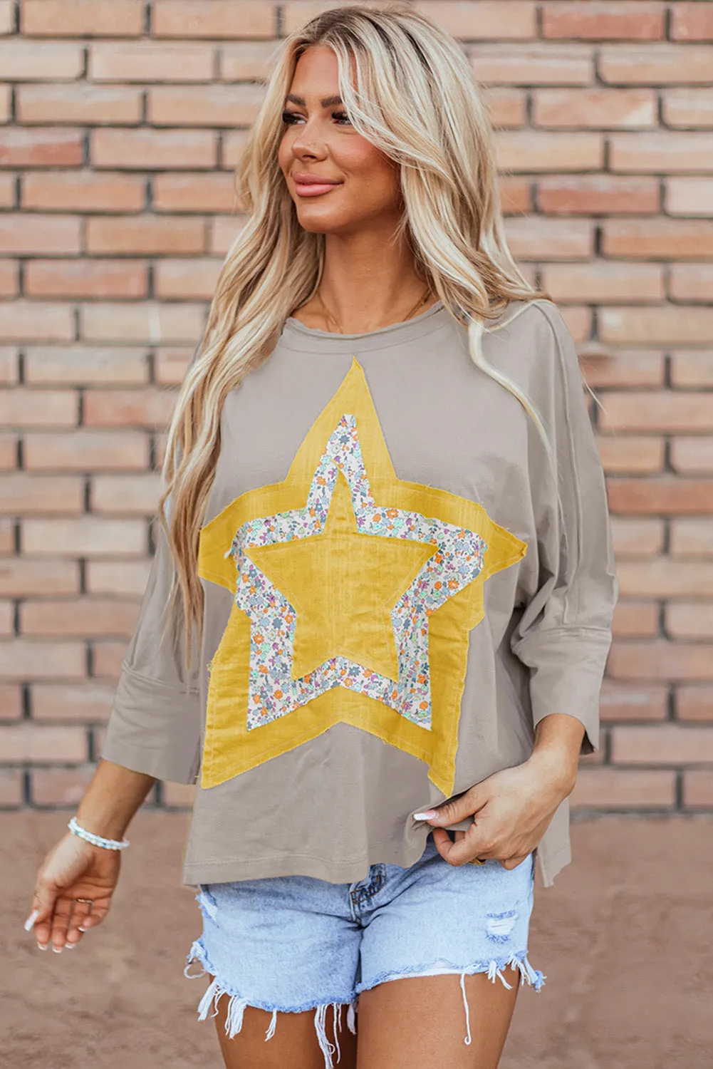 Naomi Floral Starbust Exposed Seam Mineral Wash Top by Threaded Pear sold by Zulily