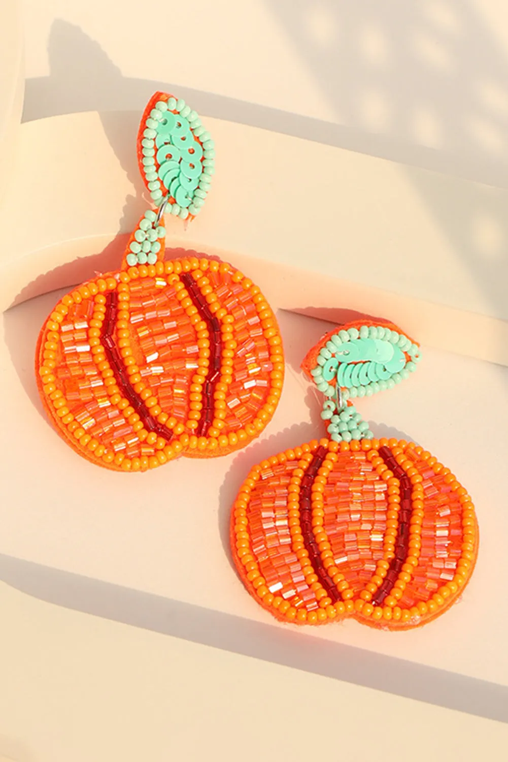Halloween Pumpkin Earrings by Threaded Pear sold by Zulily product image thumbnail 3