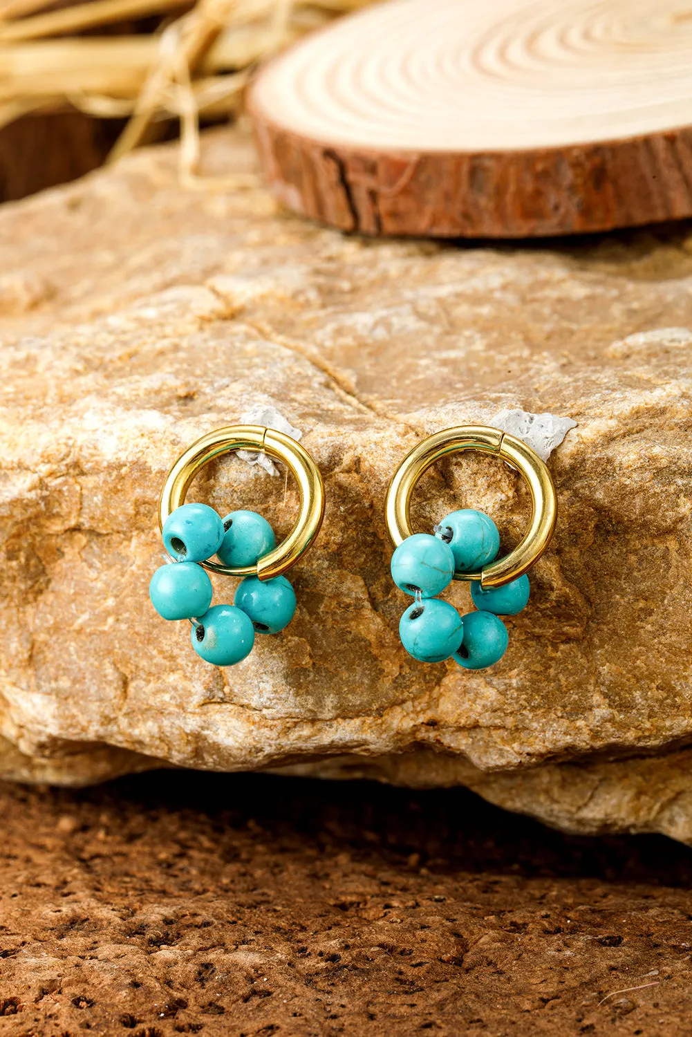 Turquoise Flower Shape Hoop Earrings by Threaded Pear sold by Zulily product image thumbnail 5