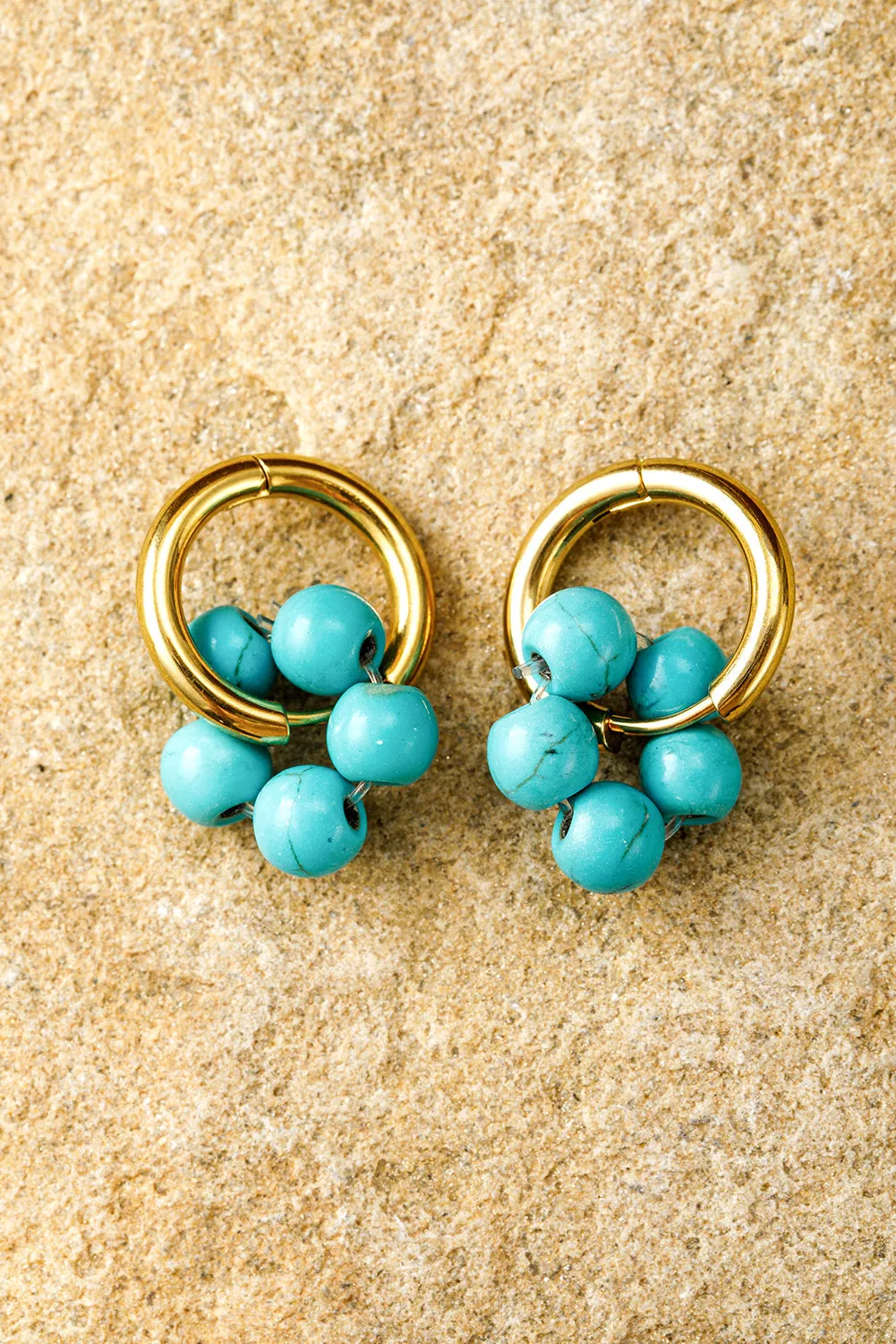 Turquoise Flower Shape Hoop Earrings by Threaded Pear sold by Zulily product image thumbnail 3