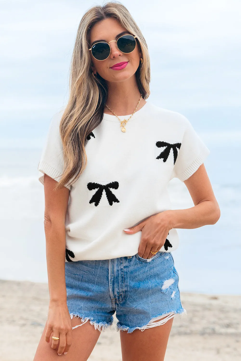 Kya Bow Pattern Knit Short Sleeve Sweater by Threaded Pear sold by Zulily