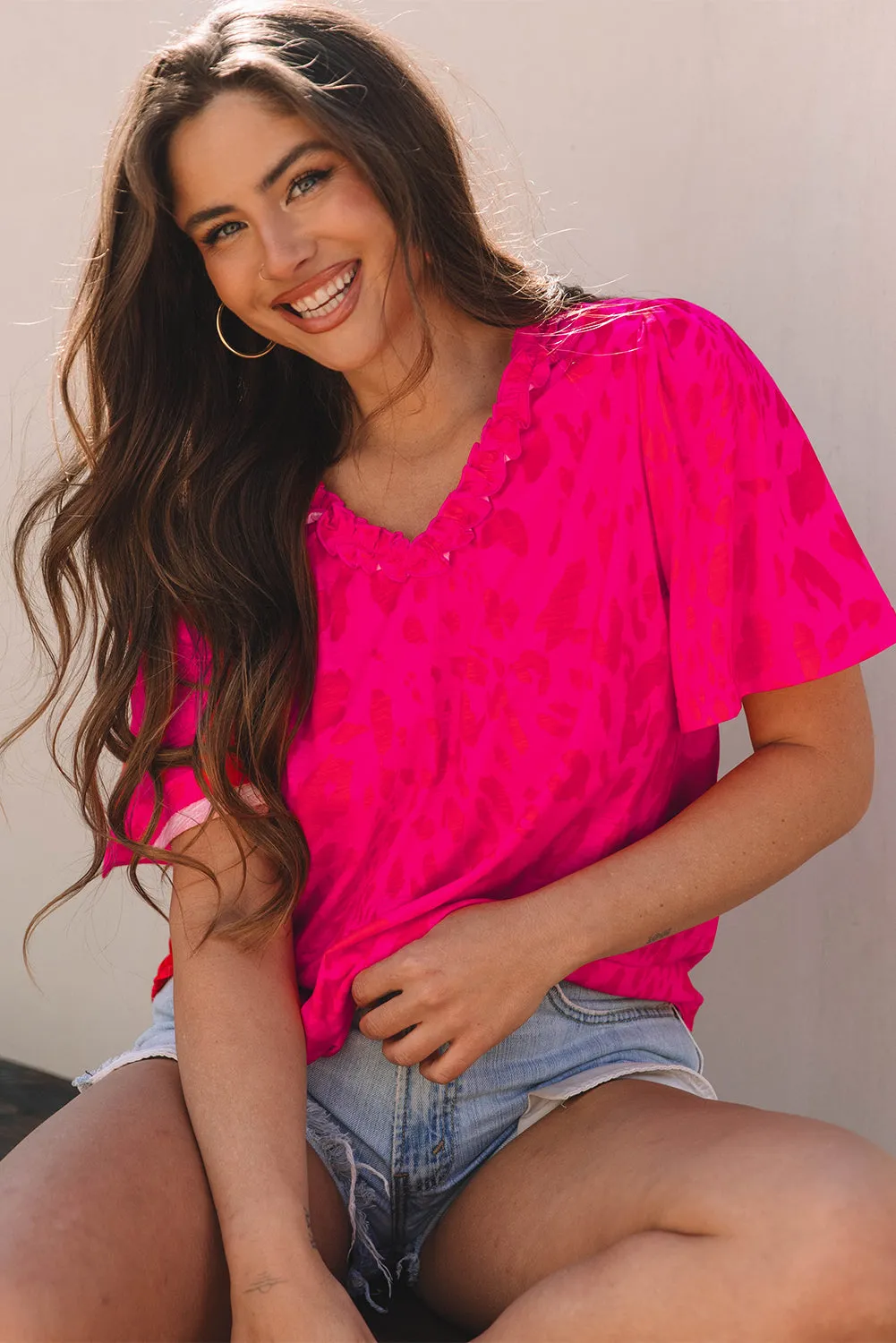 Laurel Leopard Frilly V Neck Short Sleeve Blouse by Threaded Pear sold by Zulily product image thumbnail 4