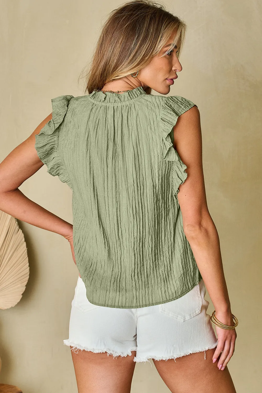 Keira V Neck Flutter Sleeve Textured Blouse by Threaded Pear sold by Zulily product image thumbnail 2