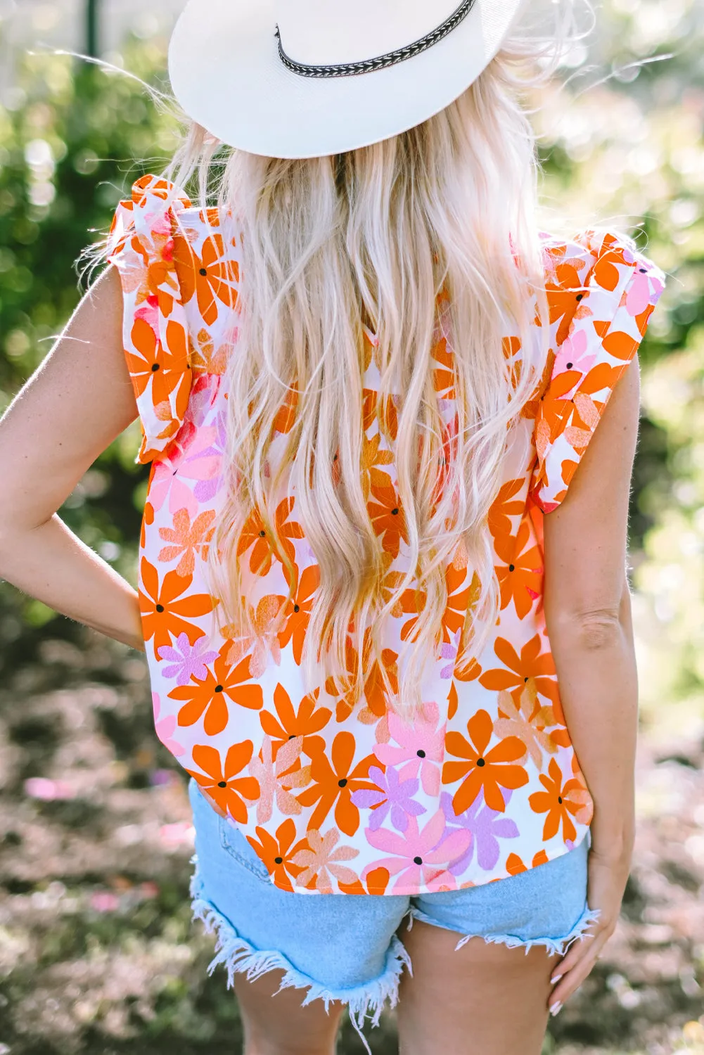 Alison Ruffled Sleeve Smocked Floral Top by Threaded Pear sold by Zulily product image thumbnail 2
