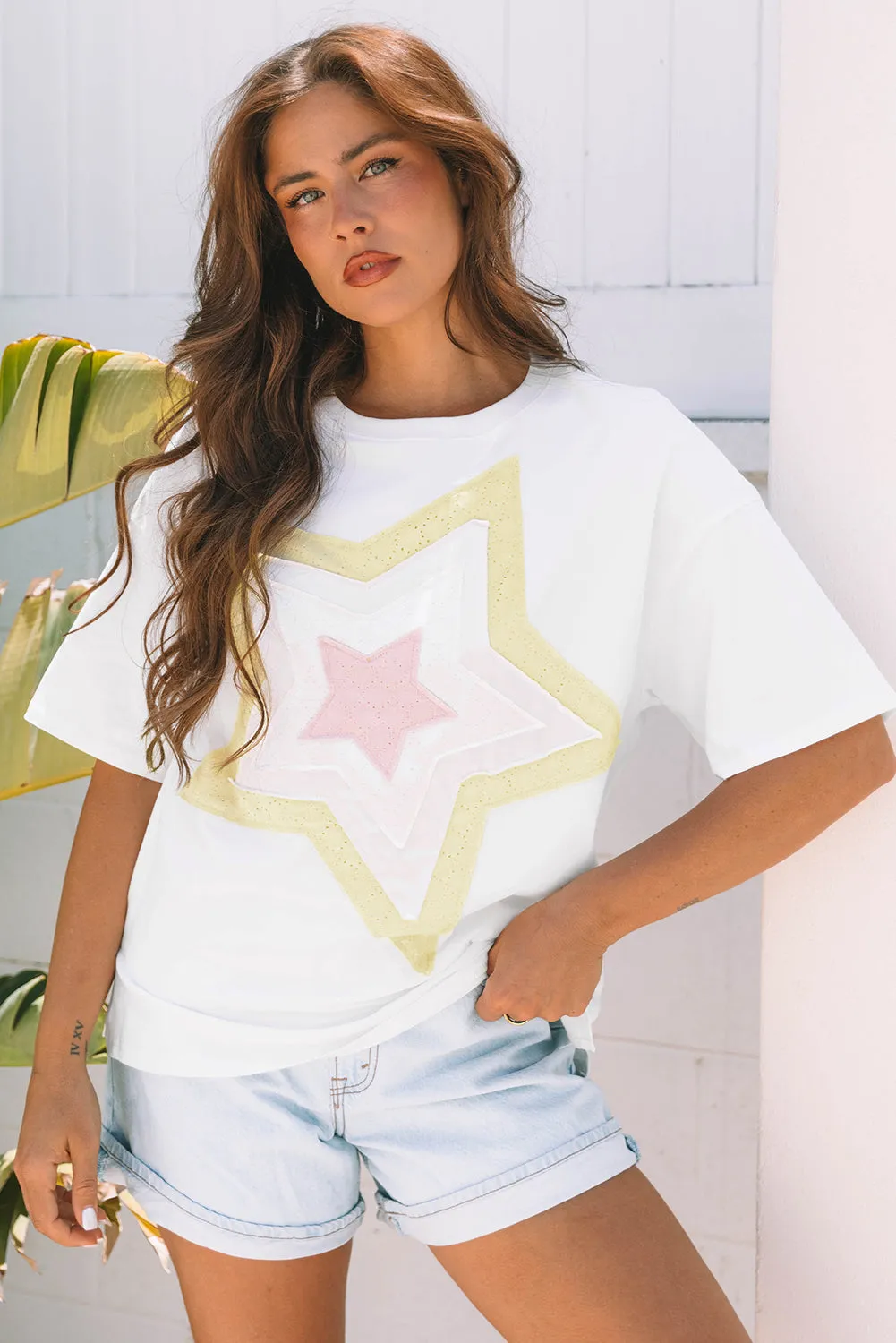 Lisa Layered Star Patched Half Sleeve Loose Top by Threaded Pear sold by Zulily
